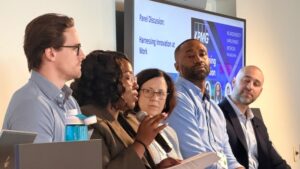 Group of panelists from harnessing innovation and connection